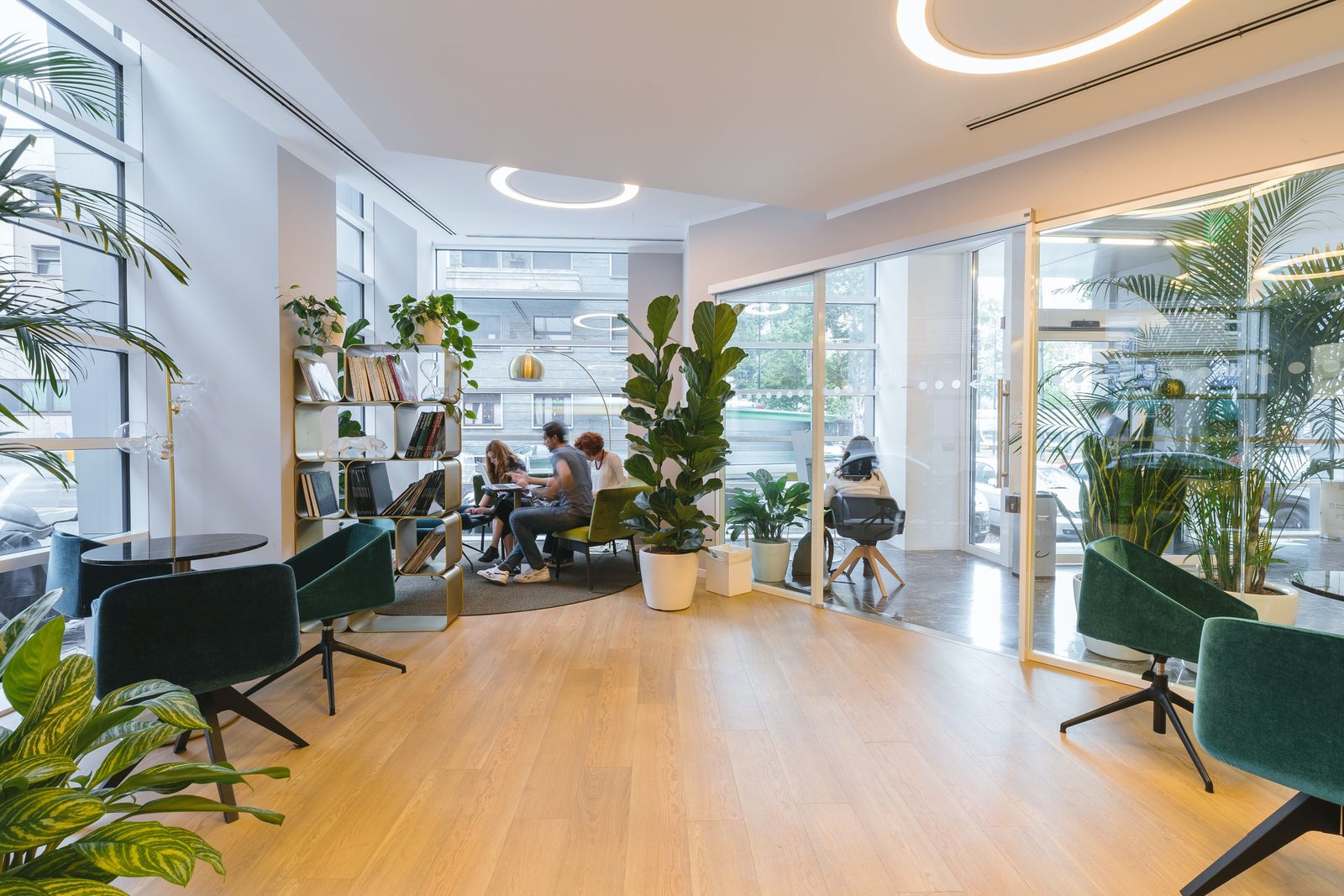 Modern office lounge with light hardwood flooring