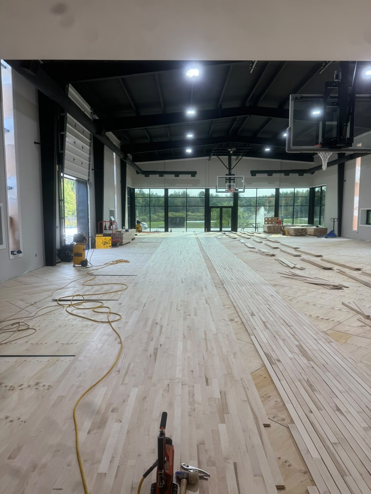 Floor machine refinishing fresh maple hardwood